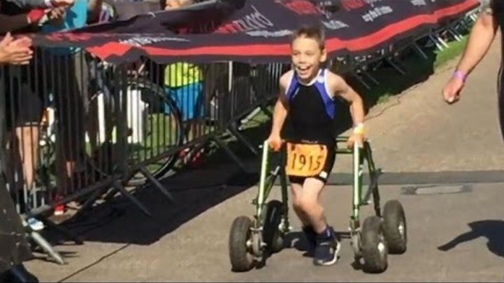 Boy with cerebral palsy finishes triathlon