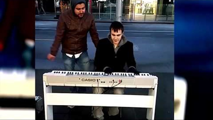 Spontaneous Dramatic Street Piano Duet