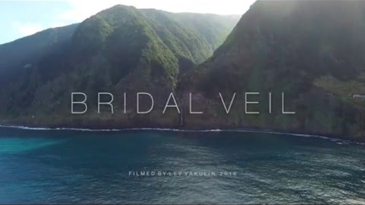 Madeira Waterfall - Véu da Noiva (Bridal Veil) in Seixal - Porto Moniz - Drone View Madeira Waterfall - Véu da Noiva (Bridal Veil) in Seixal - Porto Moniz - Drone View