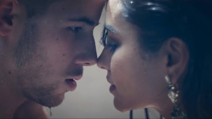 Nick Jonas Teases Sexy Shower Scene With Shay Mitchell In "Under You" Vid