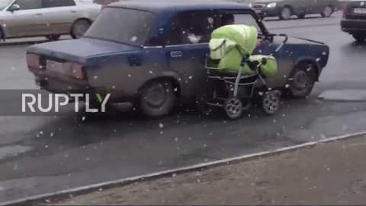 Russia: When childcare goes full Top Gear – Passenger pulls baby carriage from moving car