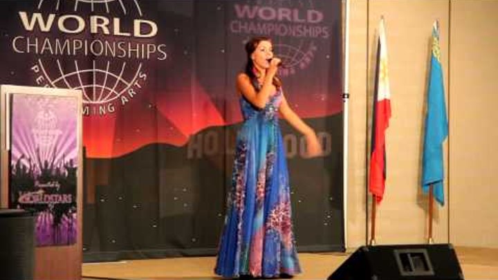 Sara Oks singing in the musical contest WCOPA
