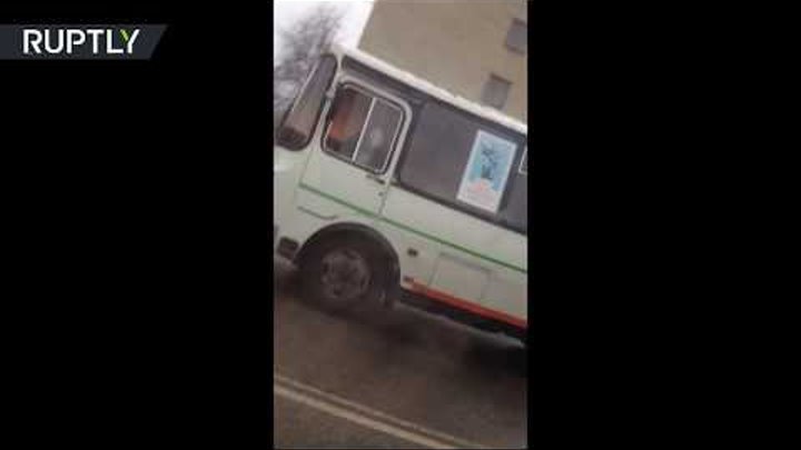 Hot wheels: Russian man casually drives bus as flames rise