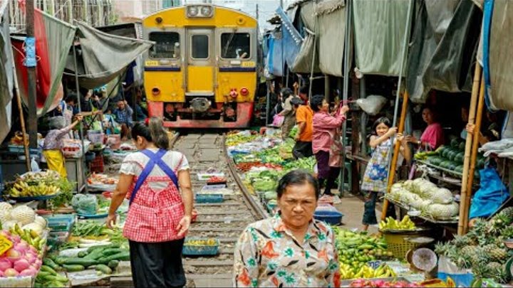 Maeklong railway market Bangkok, thailand | what happened when train is coming? - shockwave