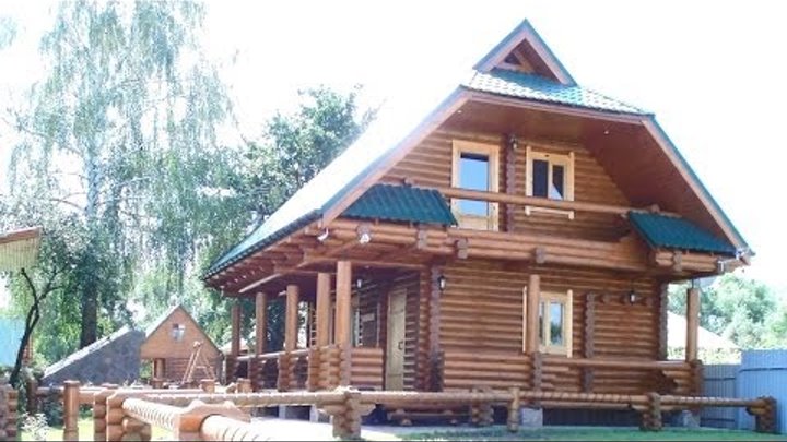 Дачный домик с мансардой из оцилиндрованного бревна. Garden house with a loft made of logs Дачный домик с мансардой из оцилиндрованного бревна. Garden house with a loft made of logs