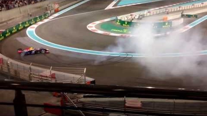 Sebastian Vettel and Mark Webber doing donuts at Abu Dhabi Grand Prix 2013.